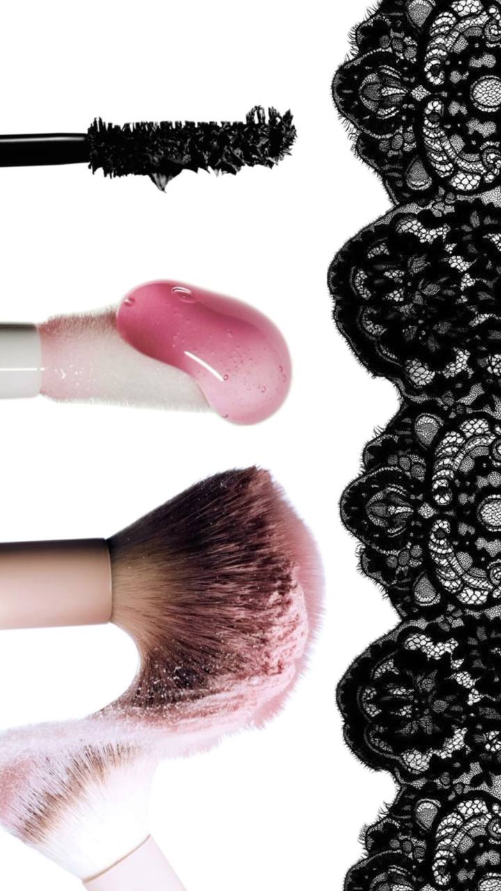 Makeup brushes, mascara and lip gloss with black lace detail